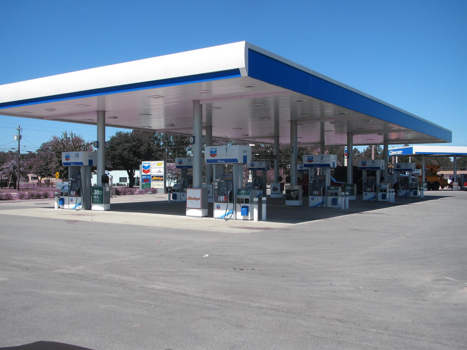 Chevron fuel station with wide fueling canopy constructed by ECDC