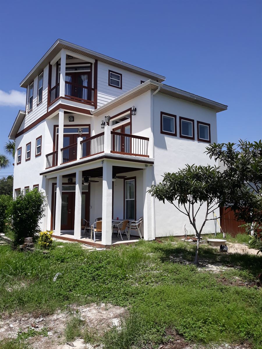 Three-story coastal custom home built by ECDC in the Florida Panhandle