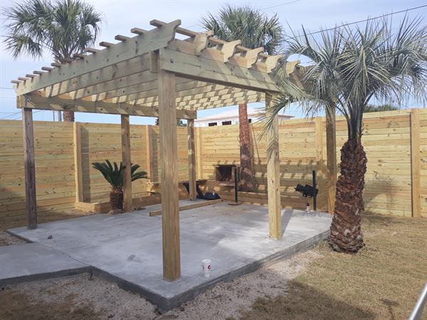 Custom wood pergola over concrete patio